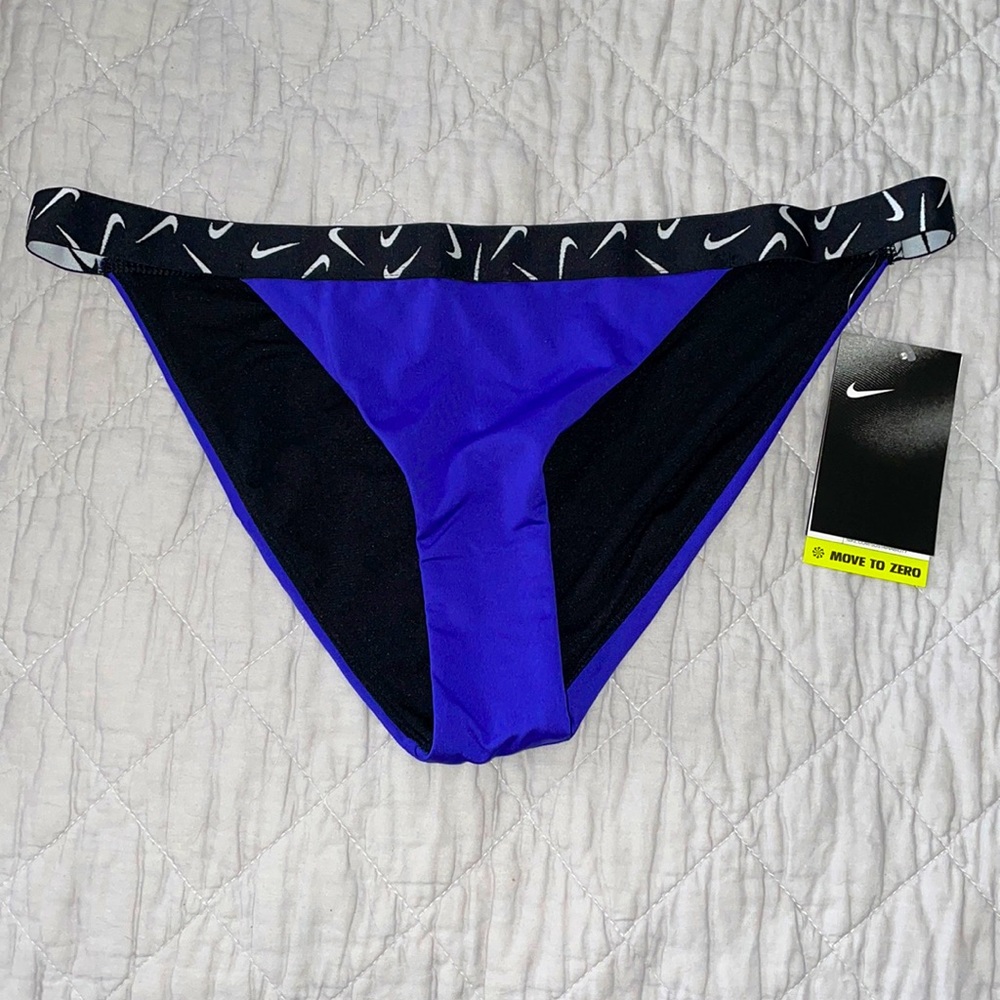 Nike women’s swimwear bikini bottom. NWT. Never worn. Purple/black/white.